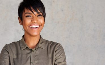 close-up-beautiful-young-black-woman-smiling-VN3SLA8-2.jpg
